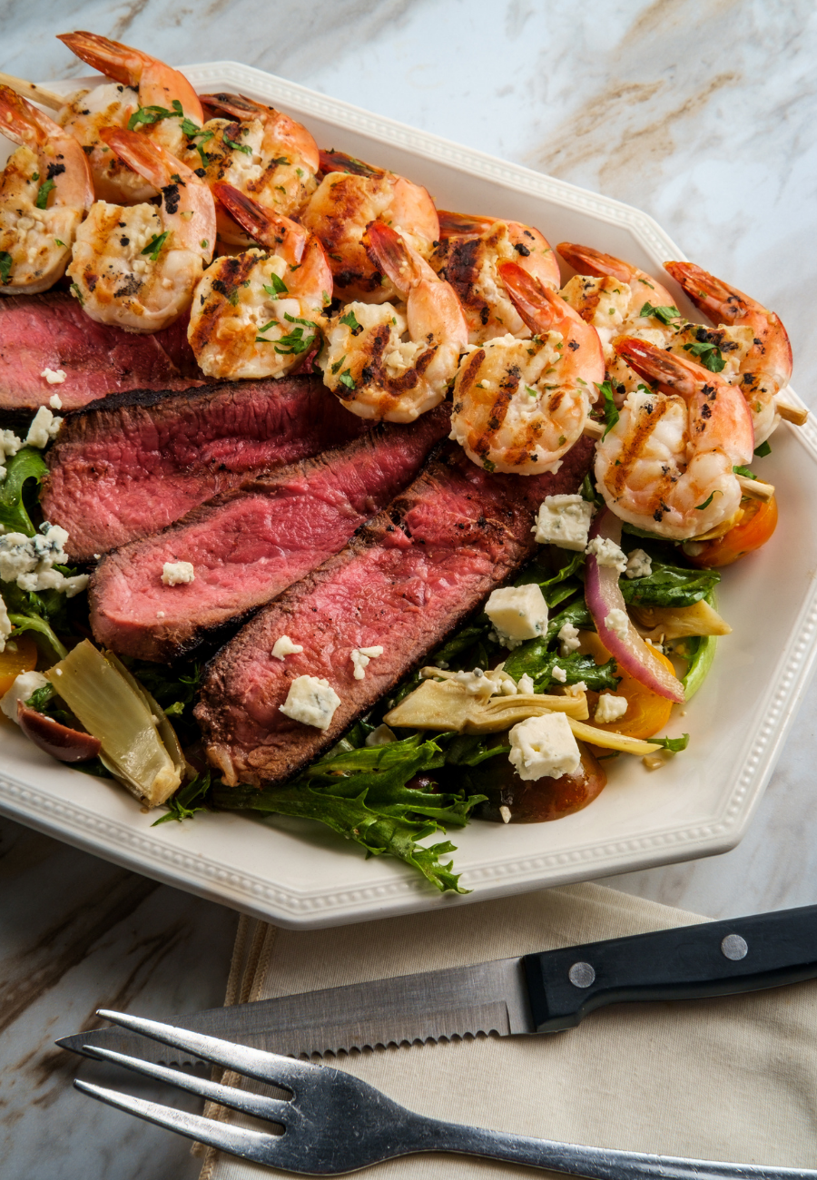 Full-time private chef plated steak and shrimp